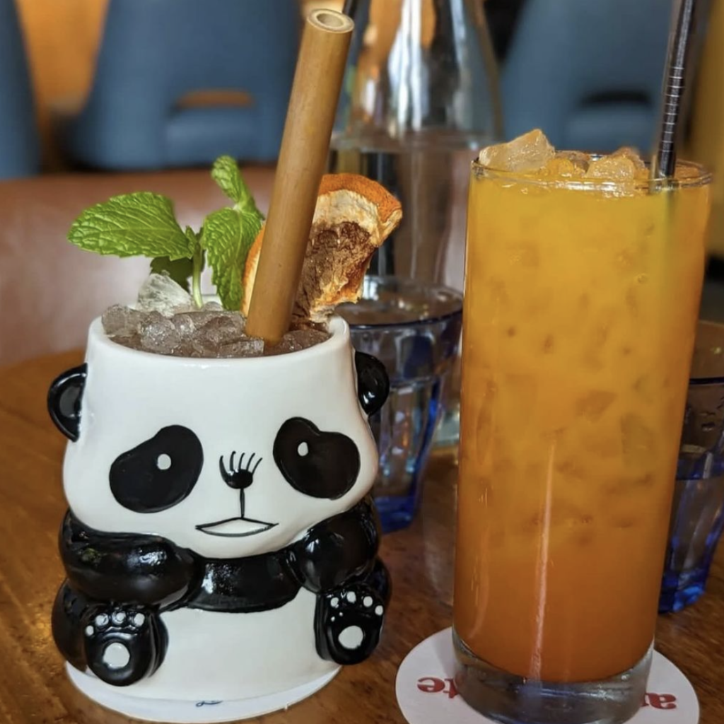 Craft cocktails, with a panda mug